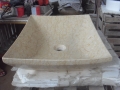 Pia de banheiro de mármore bege de forma retangular